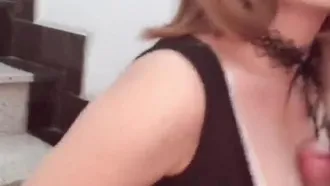 Welfare video of a beautiful young woman with big breasts giving blowjob to her sex friend in the corridor