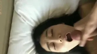 Asian beauty studying abroad enjoys eating foreign dick and cums all milk in her mouth