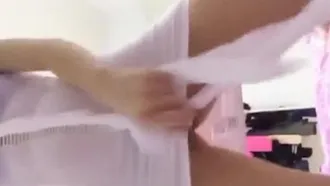 The little slut tried on sexy clothes and filmed them for her boyfriend to see, but it was leaked