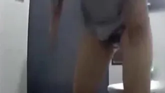 An external website leaked that a camera was secretly placed under the wash basin in the women's restroom of an office building and secretly filmed a beauty peeing. Part 2 of a beautiful girl in jeans with long, beautiful legs and sexy hairy pussy-1