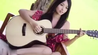 The innocent sister played a sweet guitar song in the rice field and then masturbated and squirted out of her pussy.