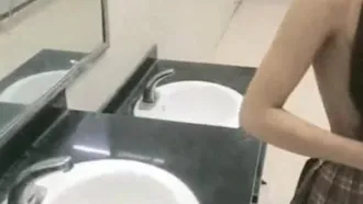 A junior girl and her boyfriend get excited about shopping and they meet up in a public restroom for a fight! Use a broom to block the door, just to get a shot!