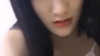 A good-looking college student's best cunt. The cute Xiaomi Li is completely naked and her pink pussy is fingering and masturbating in close-up.