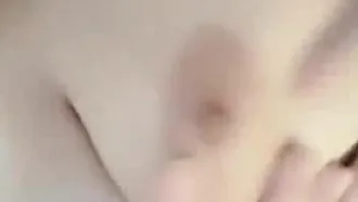 The best young girl with big boobs masturbates and makes a seductive sound