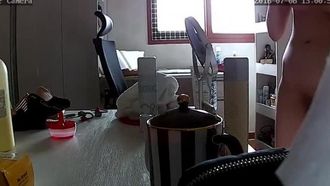 Secretly filmed a girl with beautifully done breasts taking a shower and applying skin care products