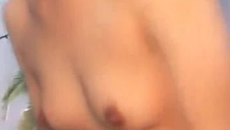 Nude girl uses massager to masturbate and squirts