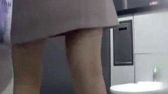An external website leaked that a camera was secretly placed under the wash basin in the women's restroom of an office building and secretly filmed a beautiful woman peeing. Part 2 of a beautiful girl in jeans with long, beautiful legs and sexy hairy pussy-2