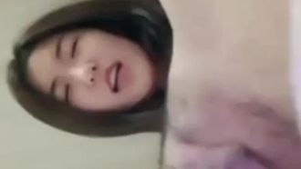 The little beauty slowly takes off her clothes on the bed and clasps her pussy with her fingers. Her slightly hairy BB is pink and very tempting.