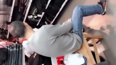 Couple sucks cock and fucks openly in the changing room of famous clothing store