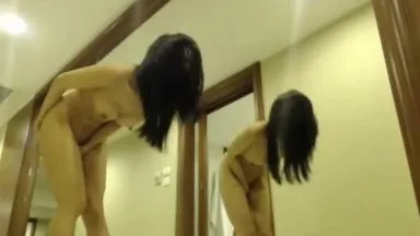 An Asian goddess with a devilish figure shows off her horse in the hallway at home and plays with electric shocks. She screams and screams in pleasure.avi