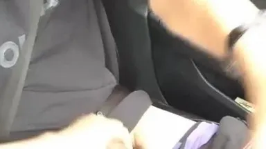 A slutty couple is having sex in the car outdoors while driving and touching their JJ while riding on the back seat and fucking each other very hard