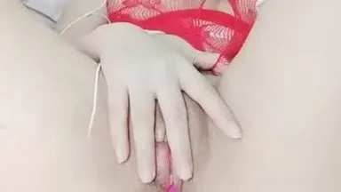 A good-looking and very slutty girl [with honey splashing everywhere] wearing sexy red fishnet stockings, a close-up of a vibrator and pussy masturbation, very tempting, don’t miss it if you like it