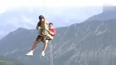 Hanging on a wire and having sex outdoors, very exciting