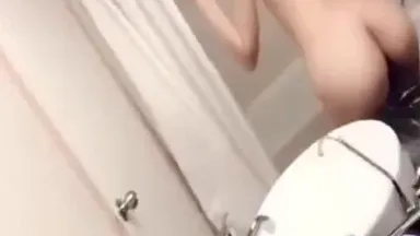 The best beauty is bored after get off work and touches her little pussy while taking a shower