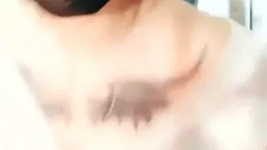 A pretty girl with beautiful breasts and two wings tattooed on her chest has a pink pussy in the third part of the vibrator vibrating masturbation show and moaning