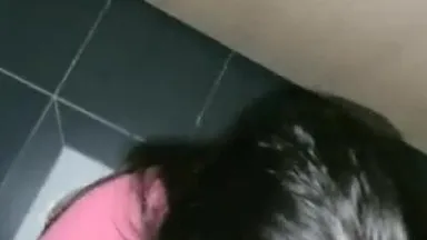 A hot girl has sex outdoors in a shopping mall toilet. She squats and gives a blowjob, takes off her butt and lifts her ass up. Then she is fucked hard and moans.