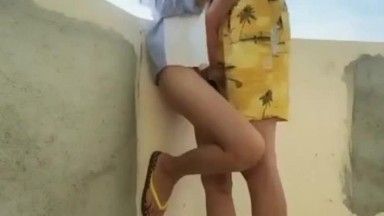 A slender girl with beautiful buttocks is kept by a rich man. She has sex on an open-air balcony facing the sea in Sanya. This environment is too exciting.